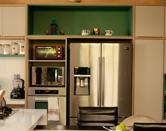 Dedicated shelf to place your microwave inside the kitchen