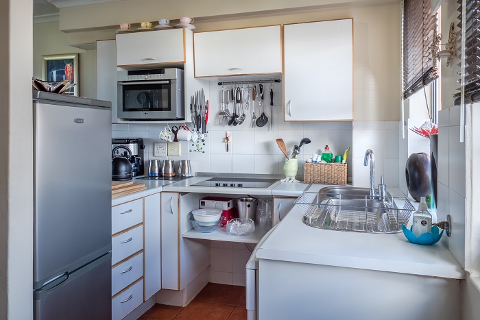 how to place a microwave inside kitchen on an upper shelf